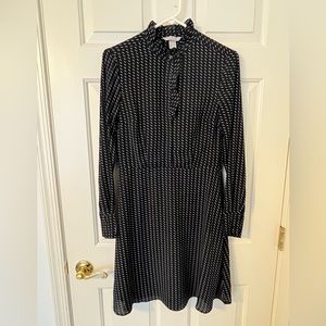 H&M black and white ruffle dress with side zip, size S.